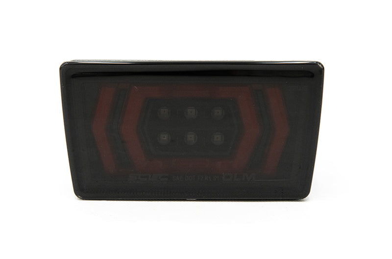 Luz OLM Vector F1 (lente ahumada/barra roja) - WRX 2022+
