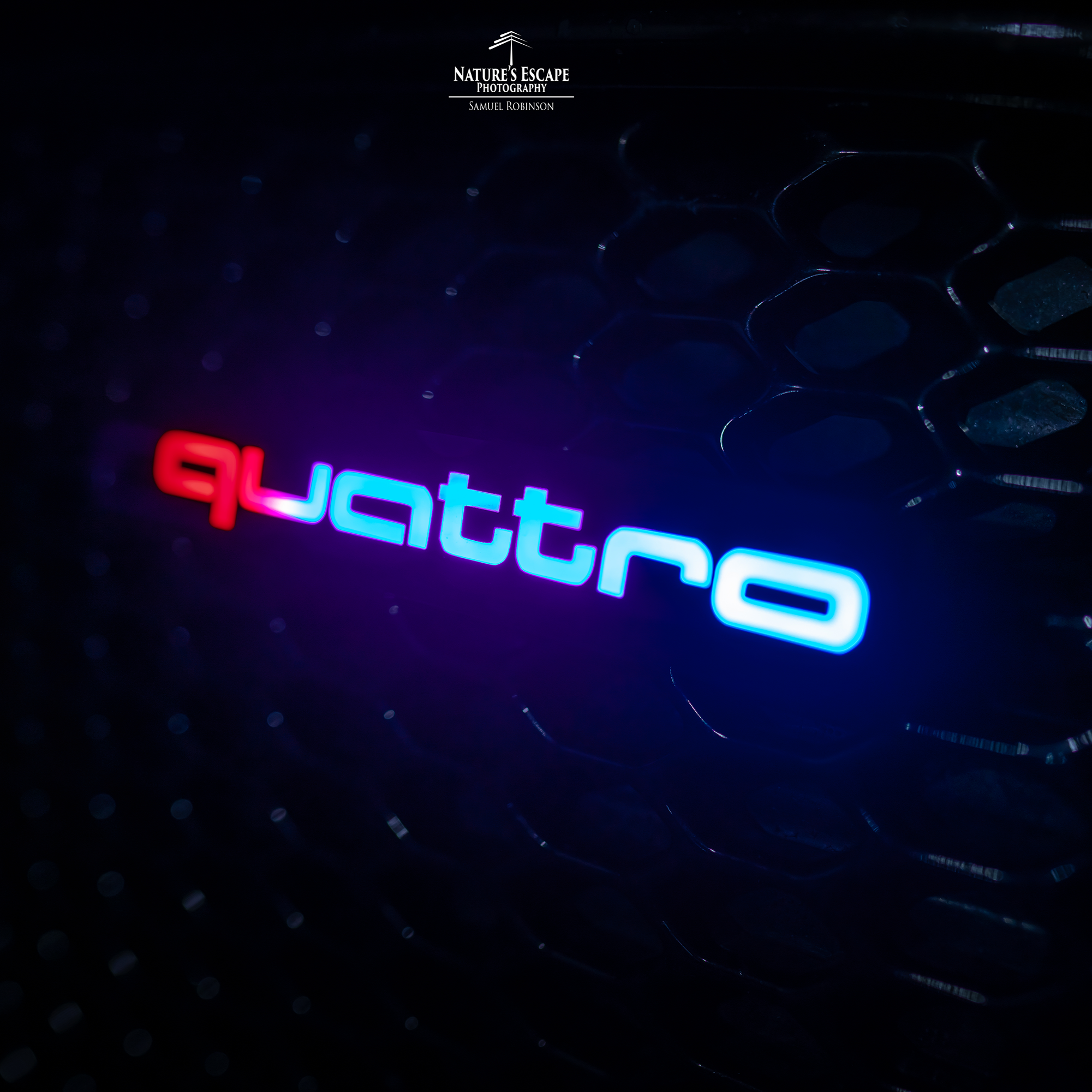 Lit Logos Quattro Grill Badge | Universal Design