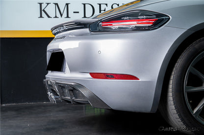 Carbonado 2017-2025 Porsche 718 Cayman Boxster GT4 Style Dry Carbon Fiber Middle Exhaust Rear Diffuser Lip