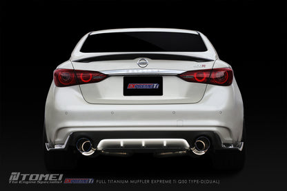 White Infiniti Q60 with a dark background and Tomei dual exhaust system.