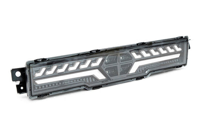 Luz antiniebla trasera OLM V2 F1 (lente transparente, base negra, barra blanca) - BRZ/GR86 2022