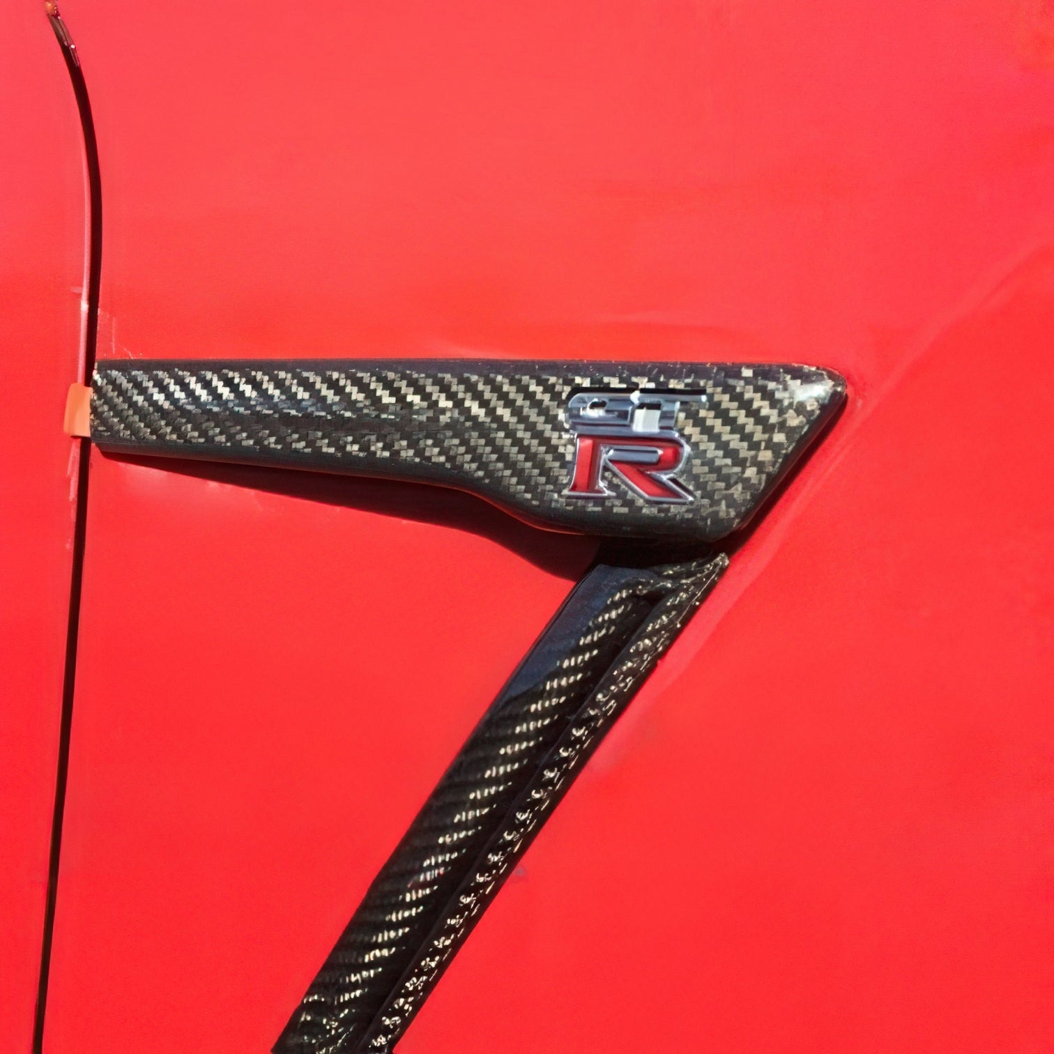 Rexpeed Carbon Fiber Emblem Cover (15+ R35 GT-R)