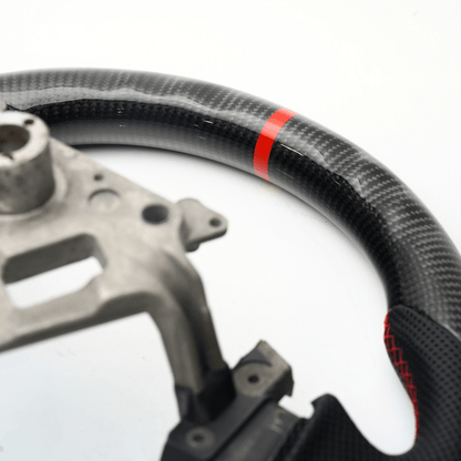 Volante JDMuscle [03-08 350Z] Serie Carbon-Lite
