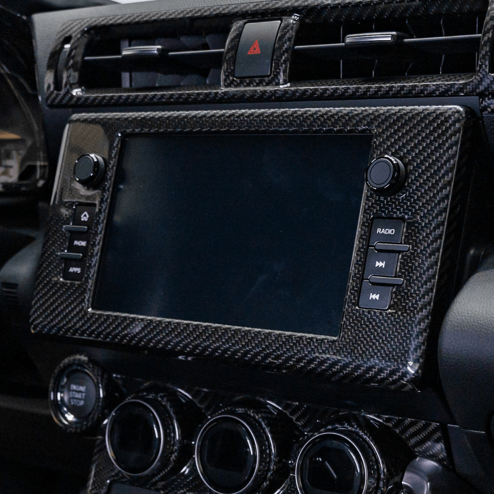 JDMuscle 22+ BRZ/GR86 Tanso Dry Carbon Fiber Center Mutimedia/ Radio Screen Cover w/ Gloss Finish