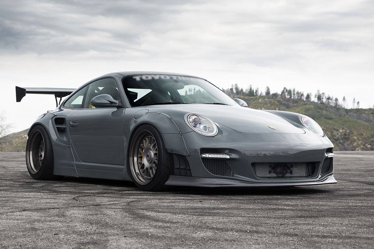 Carbonado 2009-2012 Porsche 911 997.2 TurboS 4S DE Style Auto Full Wide Body Kit