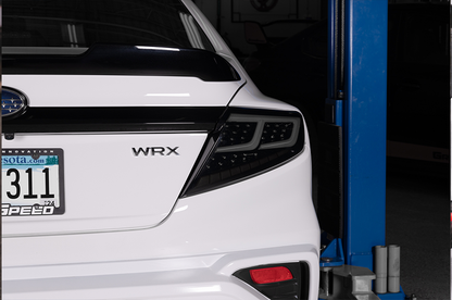 Luces traseras LED OLM Spec-AR (lente ahumada/base negra/barra blanca) - WRX 2022+