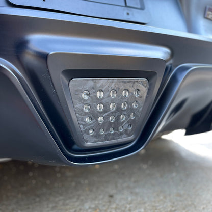 Rexpeed Carbon Fiber Reverse Light Badge (MK5 Supra) - Rexpeed