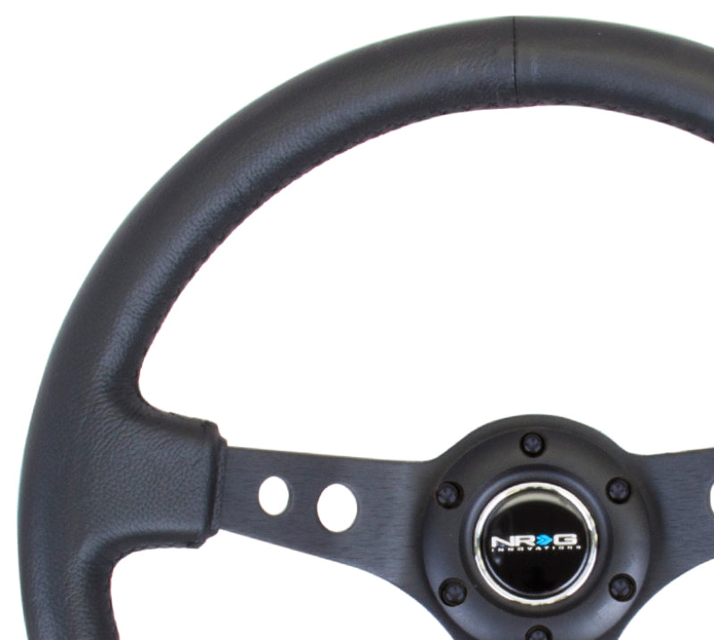 NRG Reinforced Steering Wheel Black Leather w/Black Spoke & Circle Cutouts (Universal)