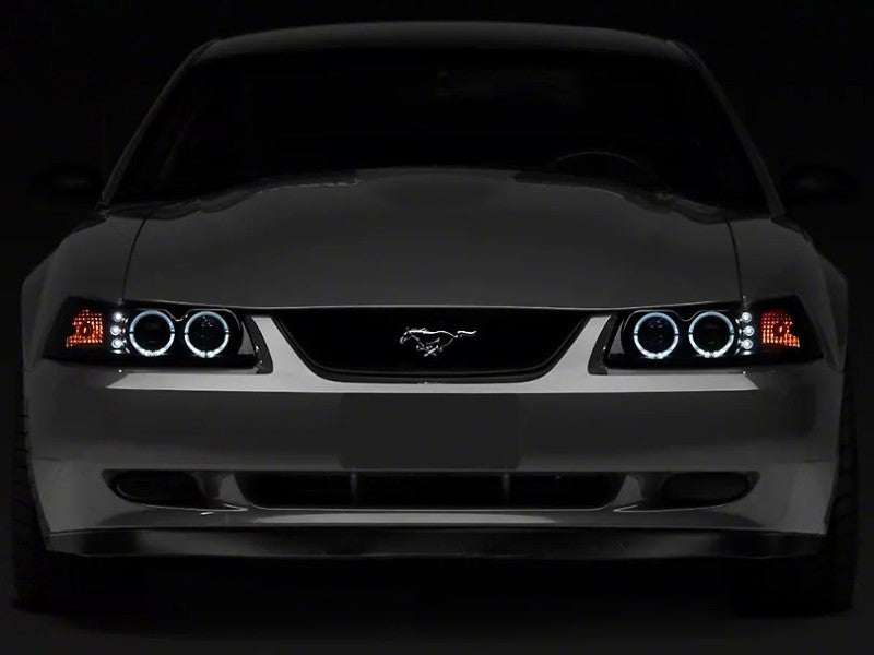 Faros delanteros con proyector de halo LED doble Raxiom, lente ahumada con carcasa negra (Ford Mustang 99-04)