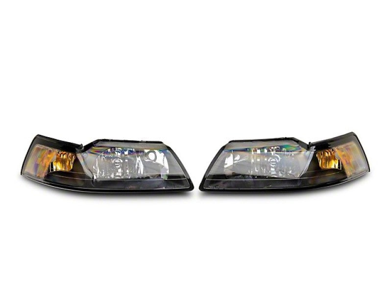 Faros delanteros de repuesto estilo OEM Raxiom Axial Series - Lente transparente con carcasa negra (99-04 Mustang)